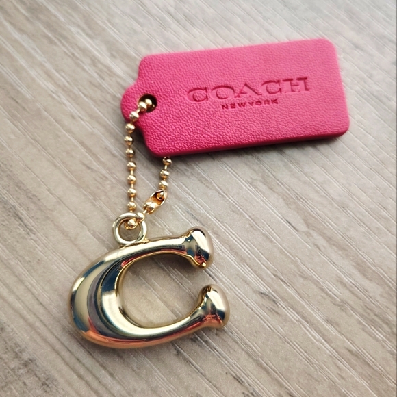 Coach Accessories - Coach Authentic Gold Pendant & Leather Hangtag
